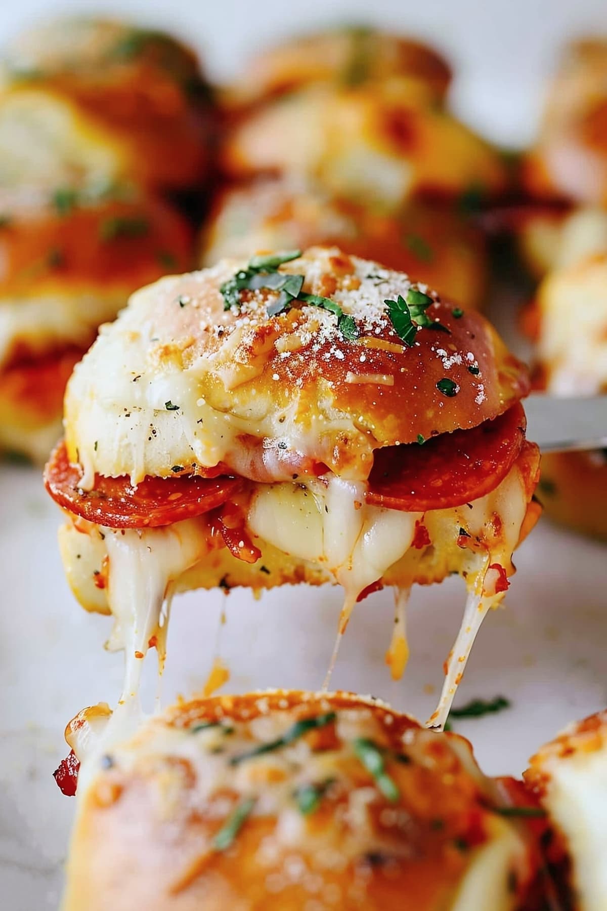 Cheesy,herby and delicious homemade pizza sliders