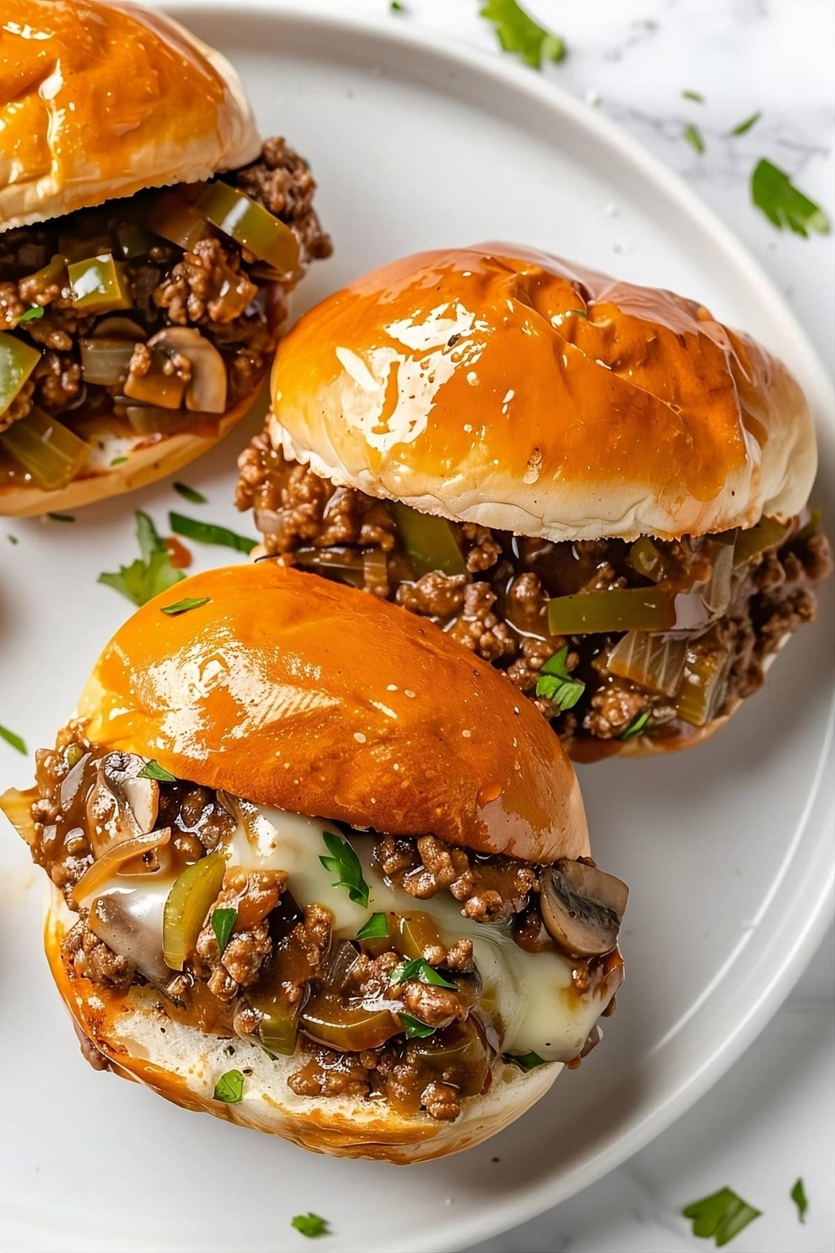 Philly Cheesesteak Sloppy Joes on a white plate.
