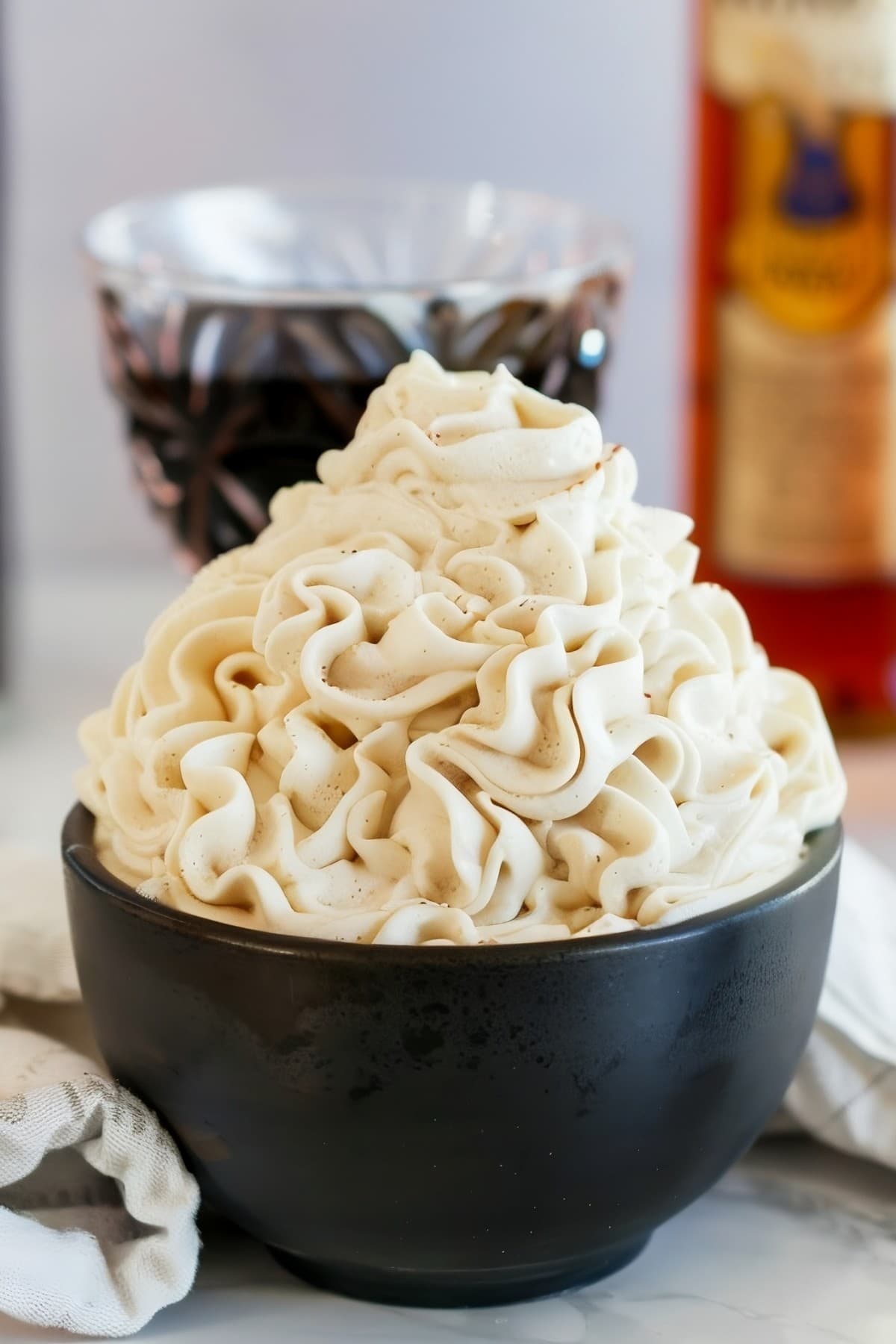 Silky Kahlua-infused whipped cream, adding a hint of coffee liqueur to your favorite desserts