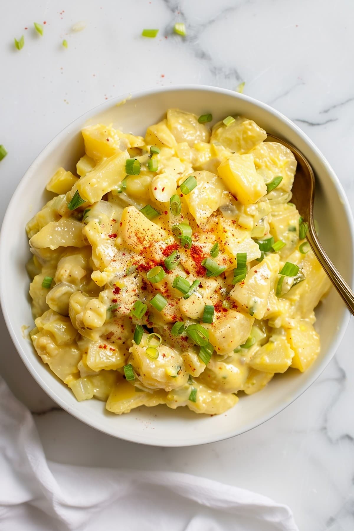 Classic Southern potato salad, featuring creamy potatoes, hard-boiled eggs, and tangy mustard dressing