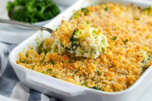 Homemade broccoli rice casserole, sprinkled with breadcrumbs for a crispy finish