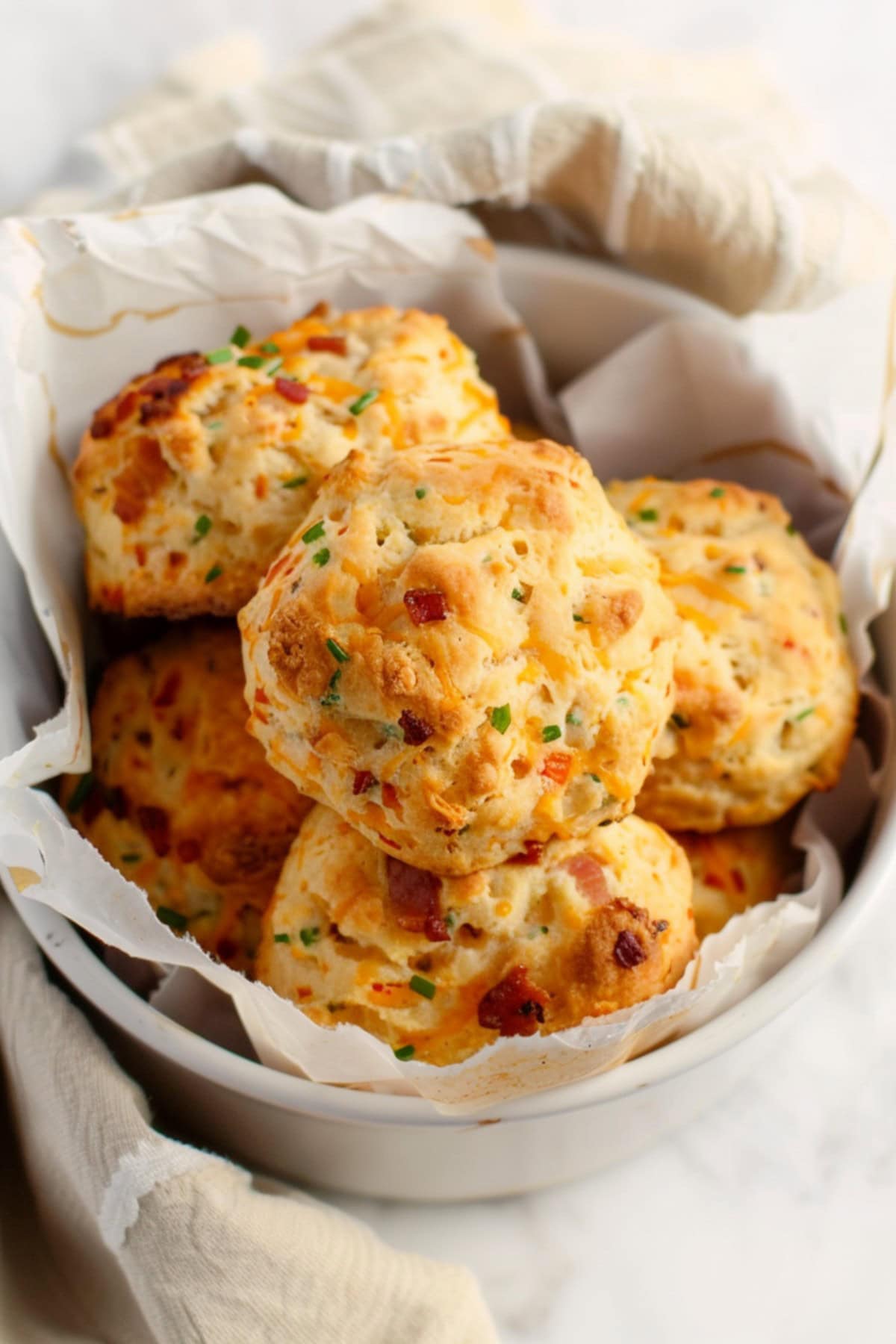 Cheesy and crumbly homemade bacon cheddar biscuits