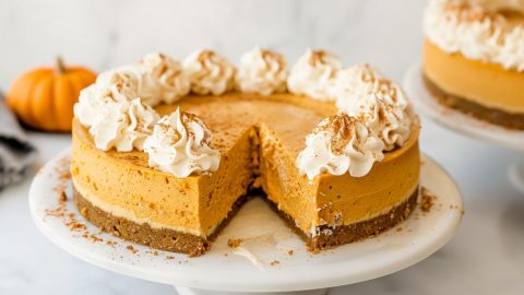 Mouthwatering no-bake pumpkin cheesecake, with layers of creamy pumpkin filling and a crunchy crust