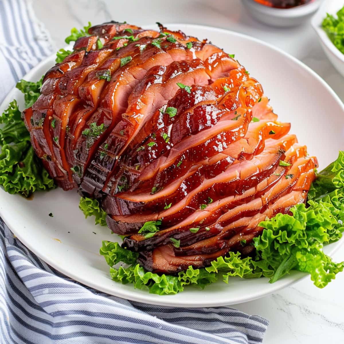 Flavorful Coca-Cola glazed ham, infused with the tangy-sweet taste of cola and aromatic spices