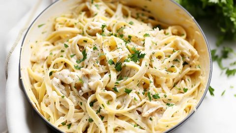 Treat your taste buds to a decadent delight as crab and fettuccine dance together in a luscious Alfredo sauce