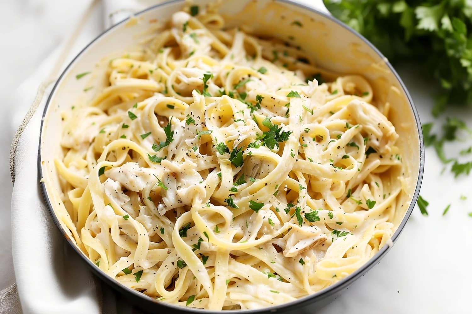 Treat your taste buds to a decadent delight as crab and fettuccine dance together in a luscious Alfredo sauce