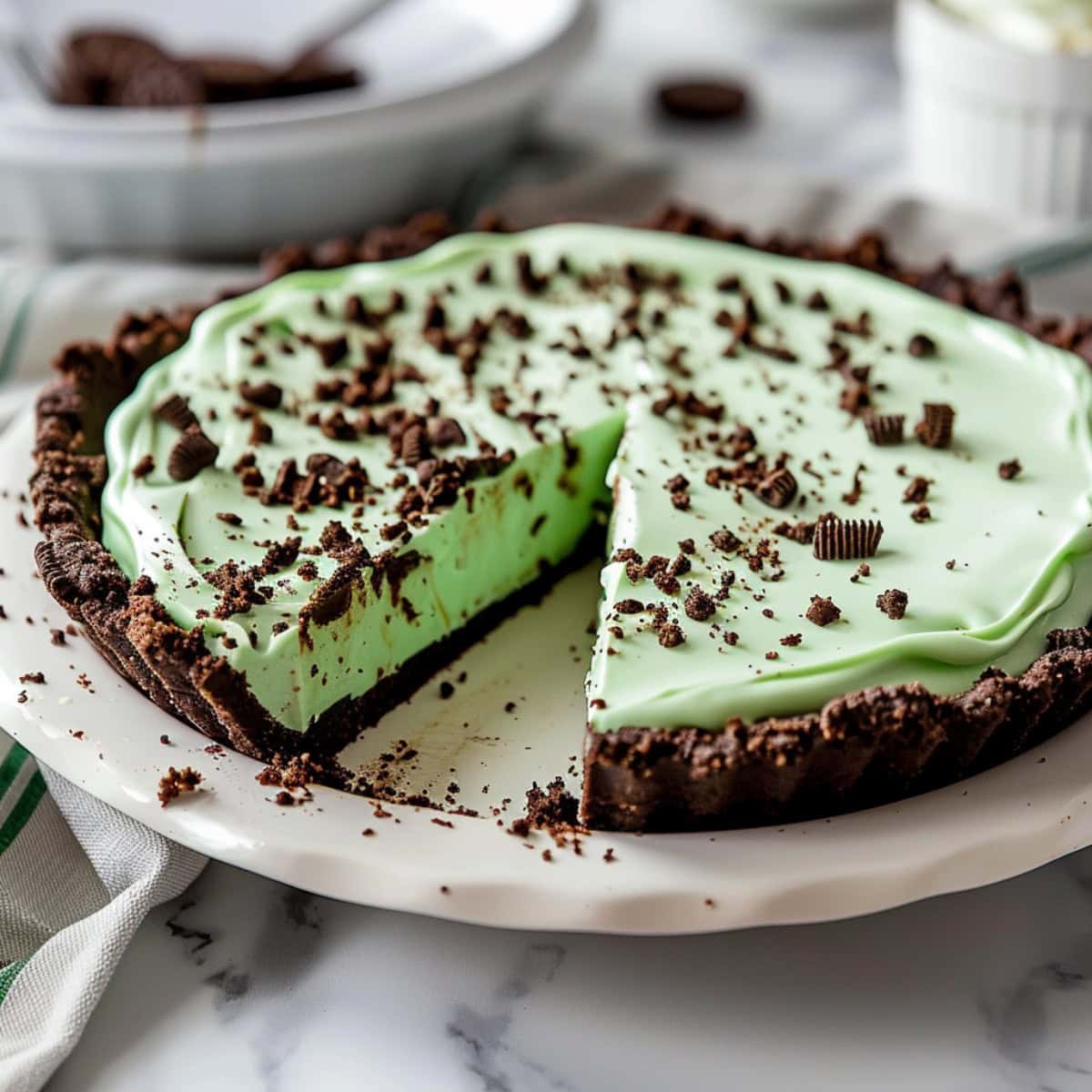 Whole Grasshopper Pie with a slice removed