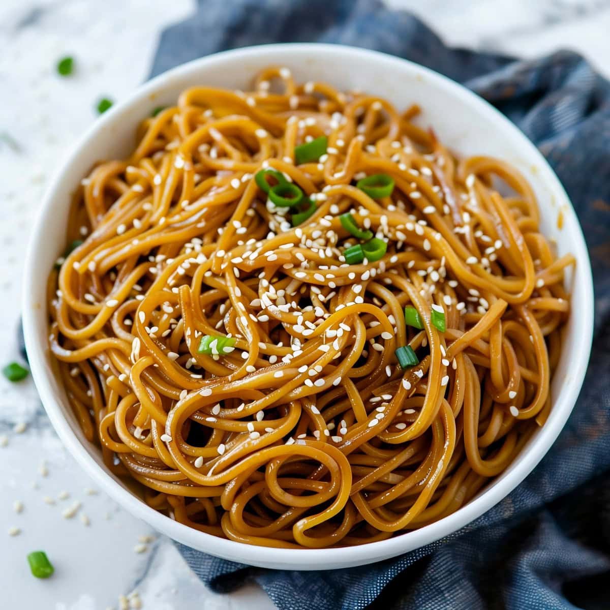Mouthwatering hibachi noodles, cooked with a touch of teriyaki sauce and garnished with sesame seeds