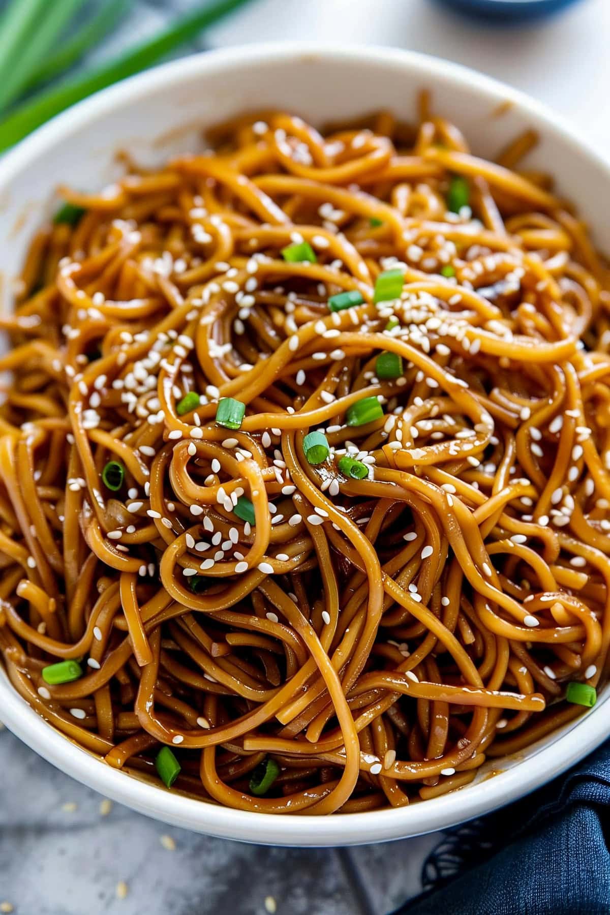 Vibrant hibachi noodles, bursting with flavor from a combination of fresh vegetables and aromatic seasonings