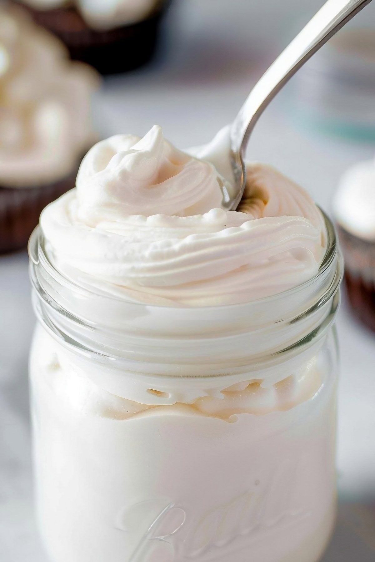 Creamy marshmallow fluff in a glass jar