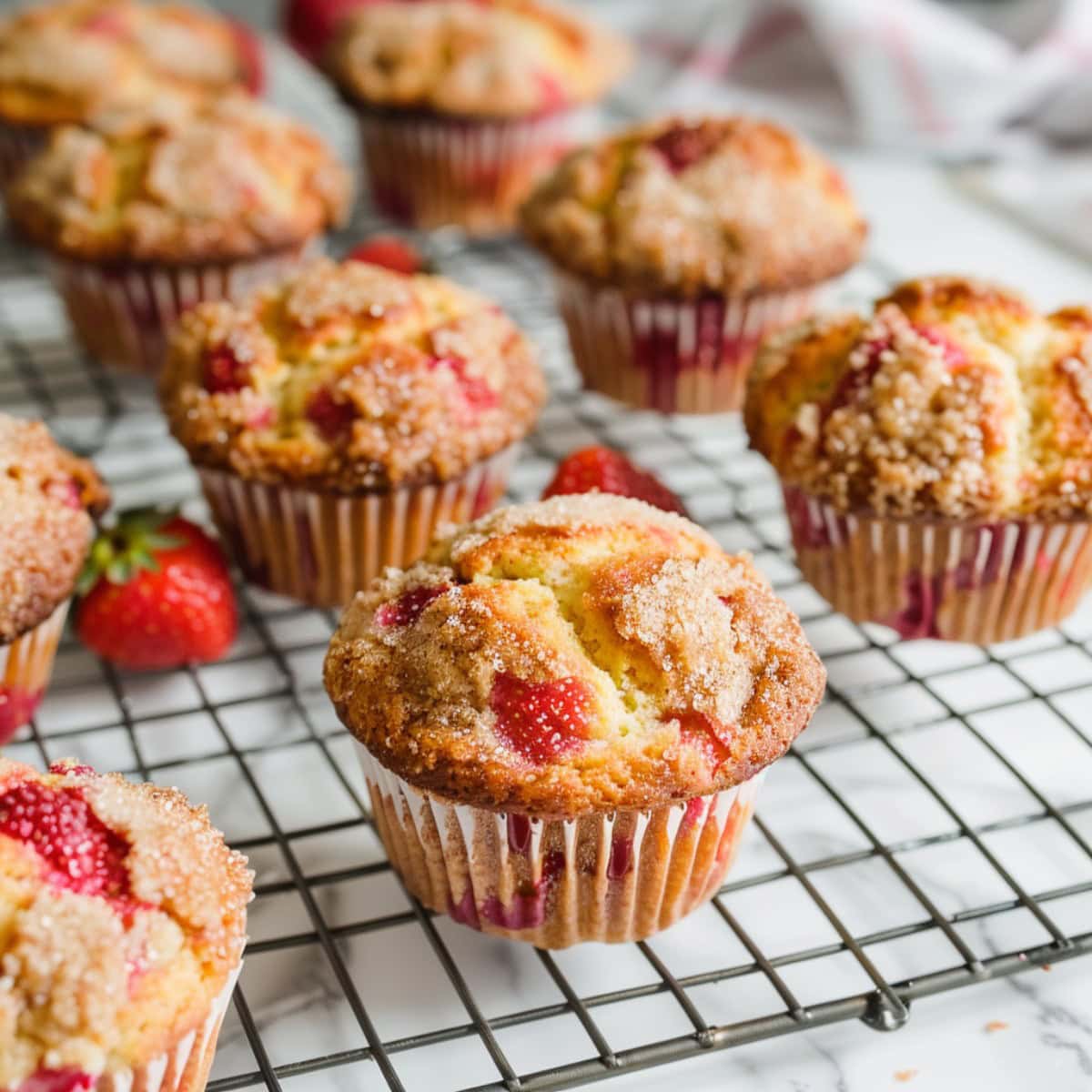 Homemade muffins, bursting with the sweet taste of ripe strawberries