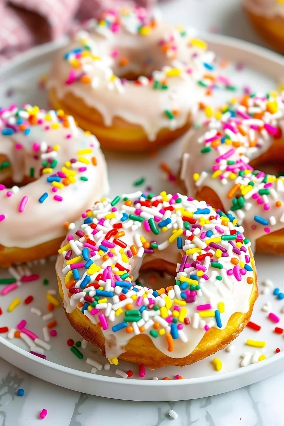 Pancake mix donuts with sugar glaze and sprinkles 