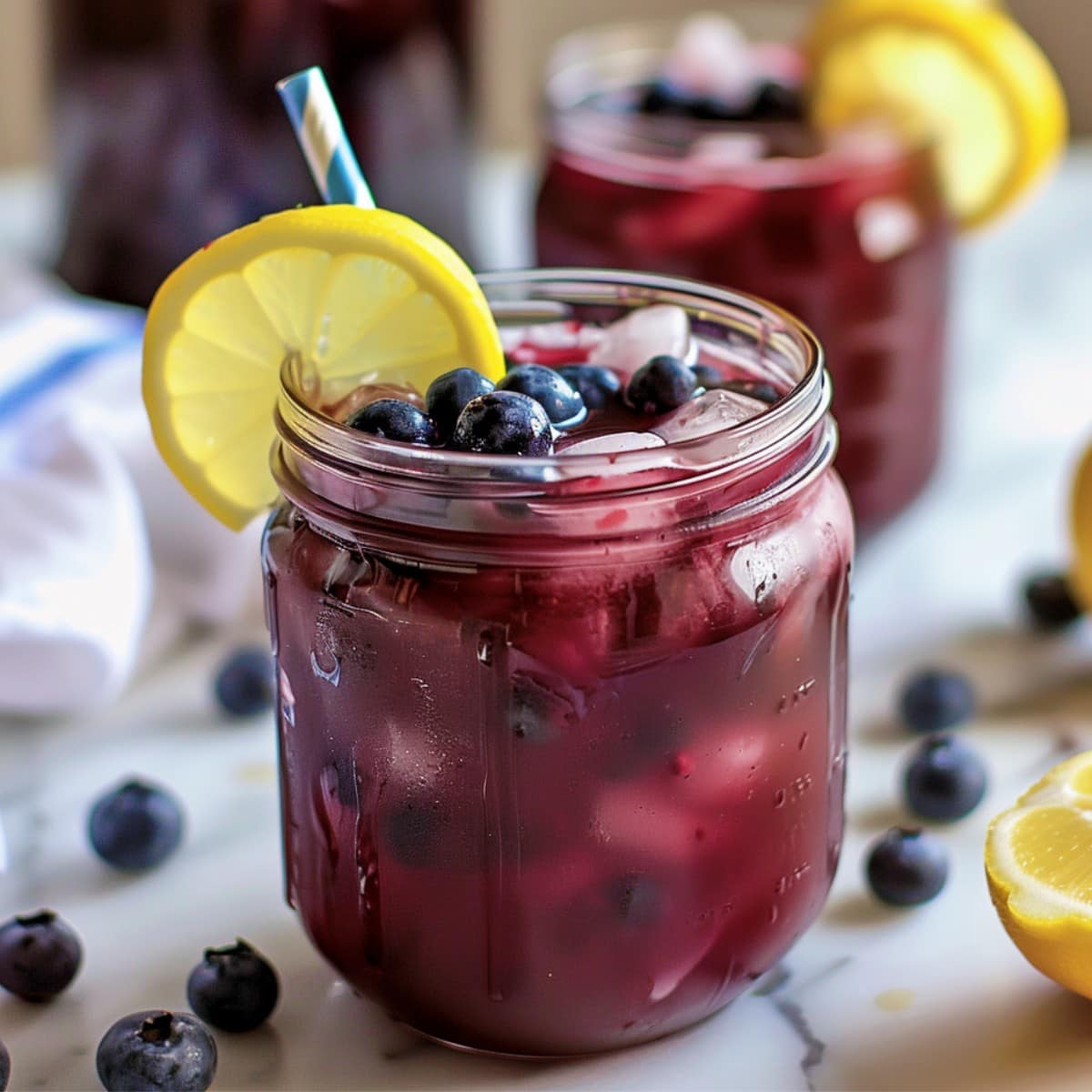 Homemade blueberry lemonade, bursting with juicy blueberries and zesty lemon flavor
