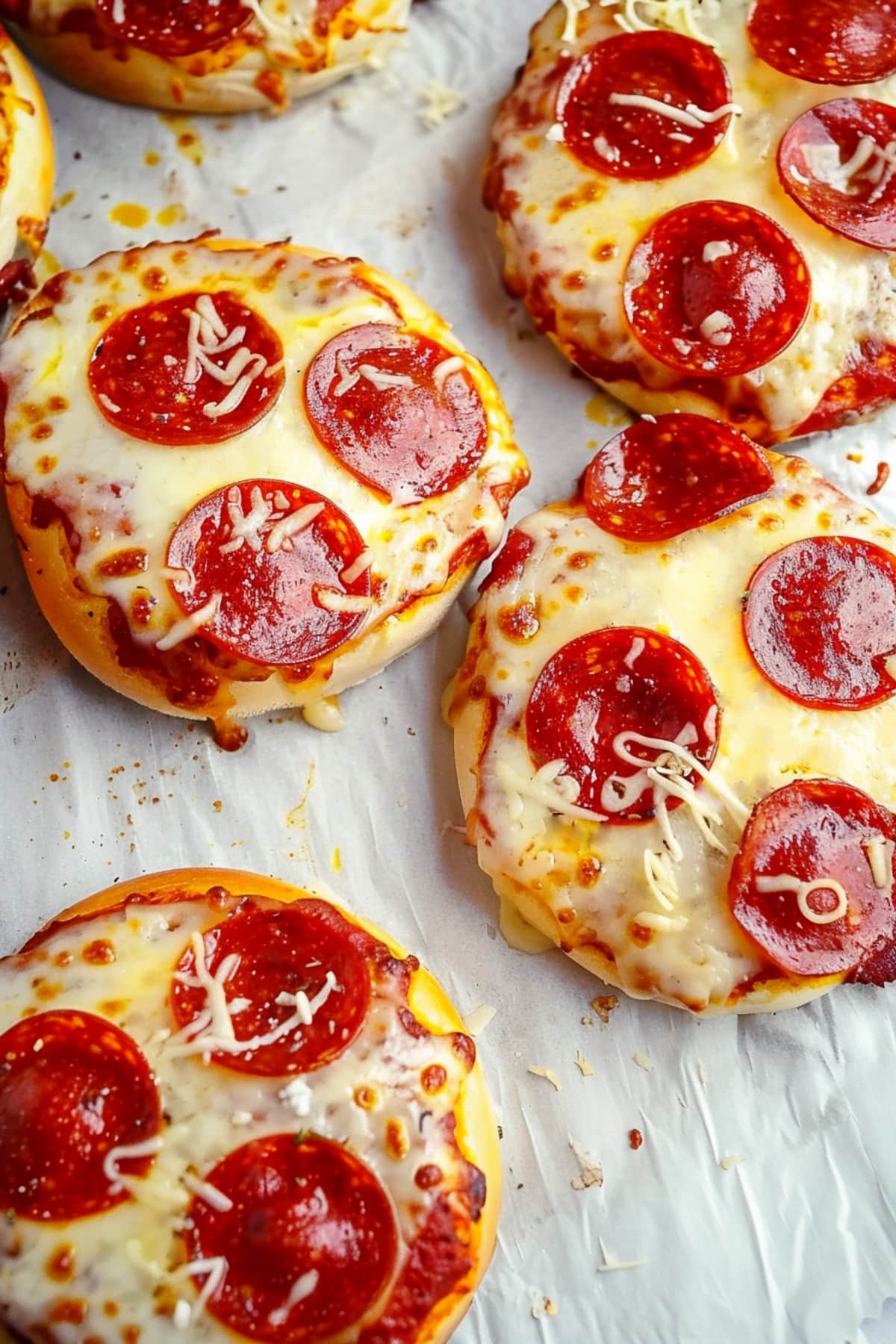 Flavor-packed pizza burgers with pepperoni slices, smothered in marinara sauce and melted mozzarella