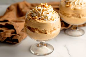 Homemade mousse, crafted with creamy peanut butter, powdered sugar, and whipped cream for a luxurious texture