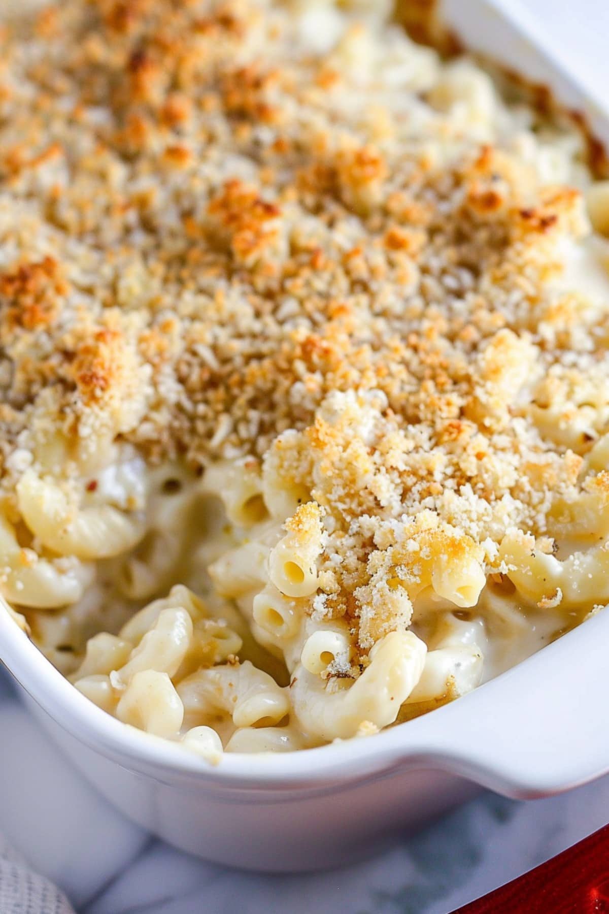 Classic white cheddar mac and cheese with panko, a comforting dish perfect for any occasion, from family dinners to potlucks