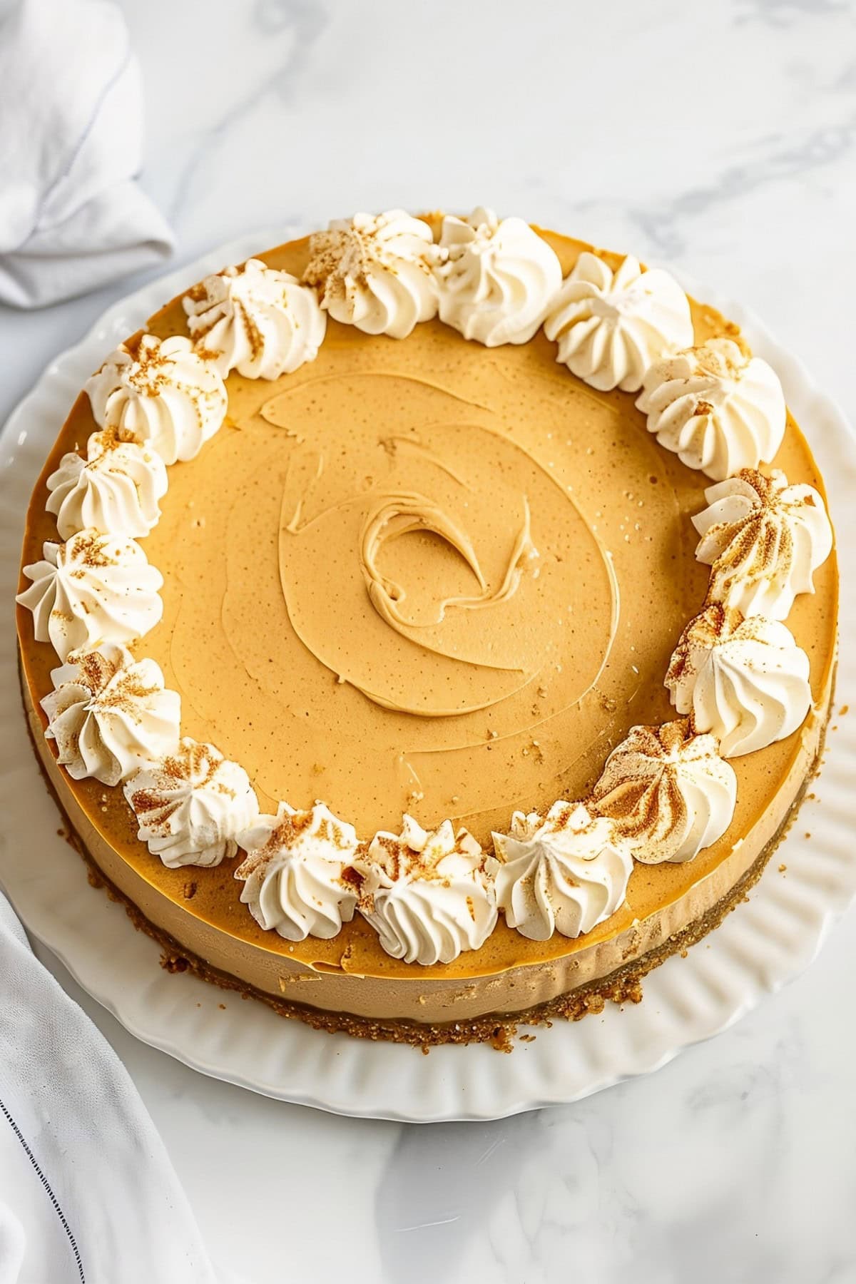 Creamy no-bake pumpkin cheesecake, a deliciously easy dessert perfect for fall gatherings