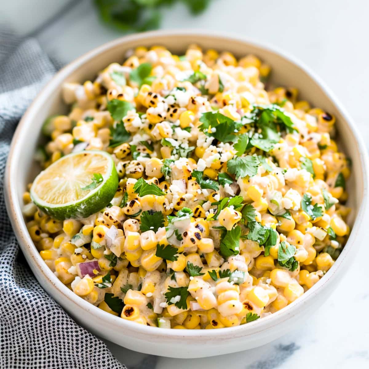 Vibrant Mexican street corn salad, featuring cotija cheese and a zesty lime dressing.