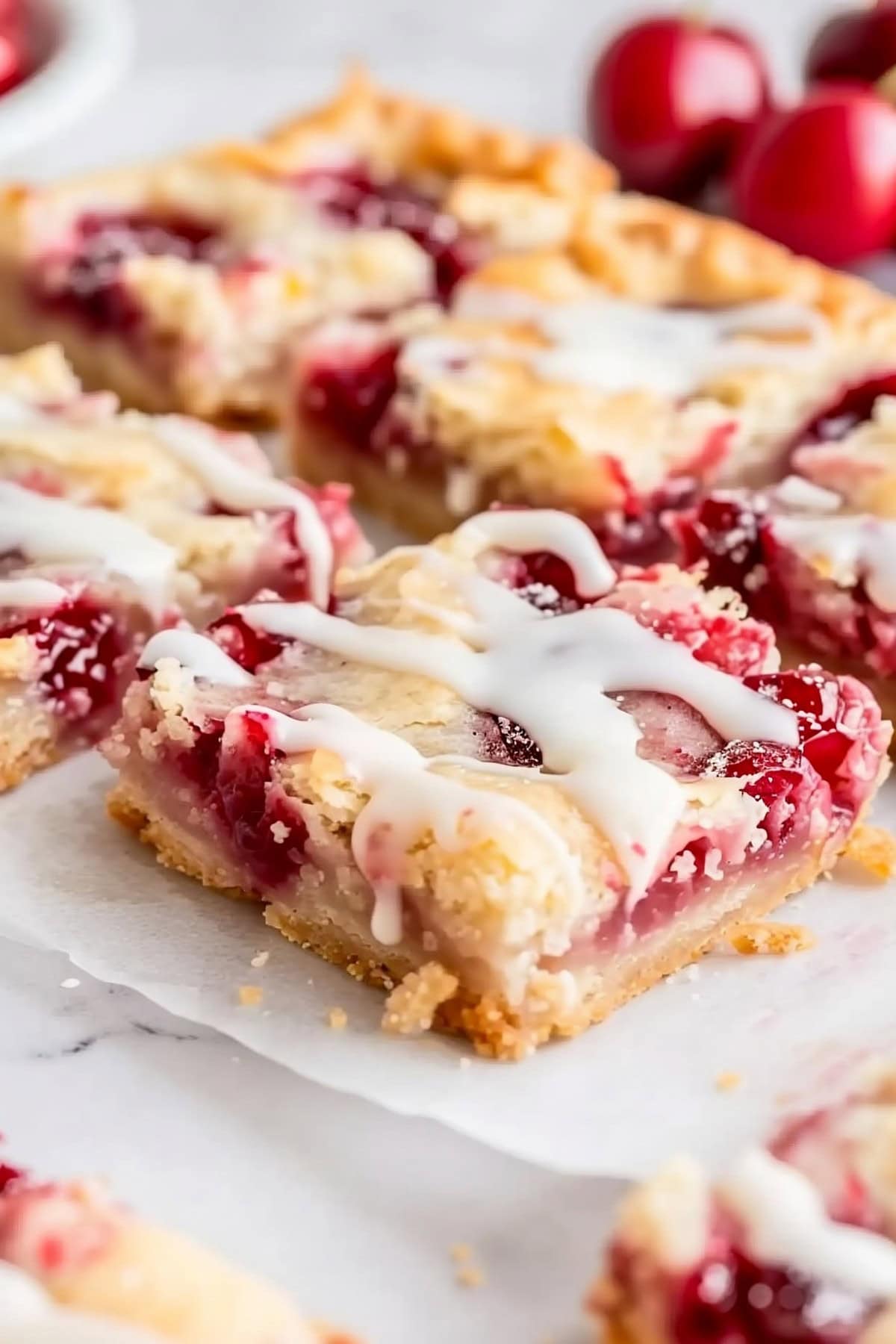 Sweet and buttery homemade cherry pie bars drizzled with vanilla glaze
