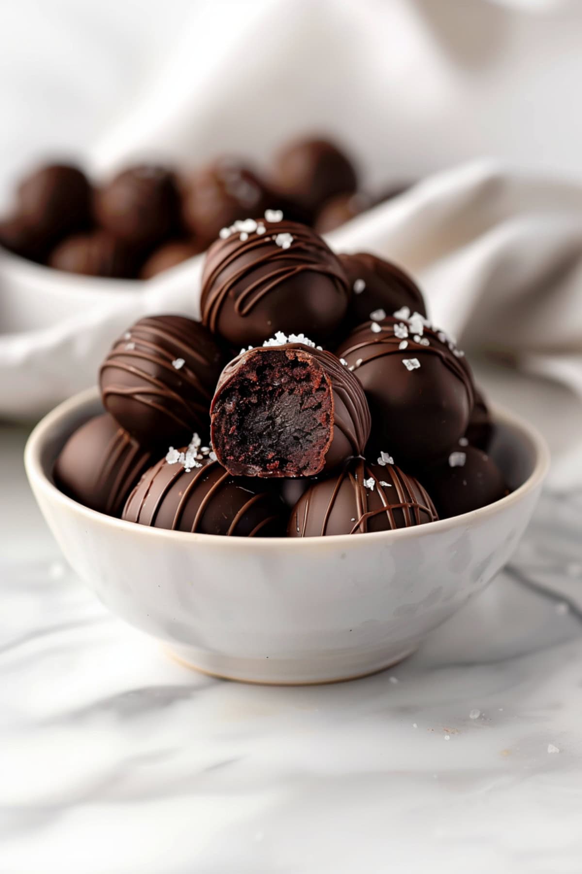 Homemade brownie truffle balls with chocolate glaze and sea salt