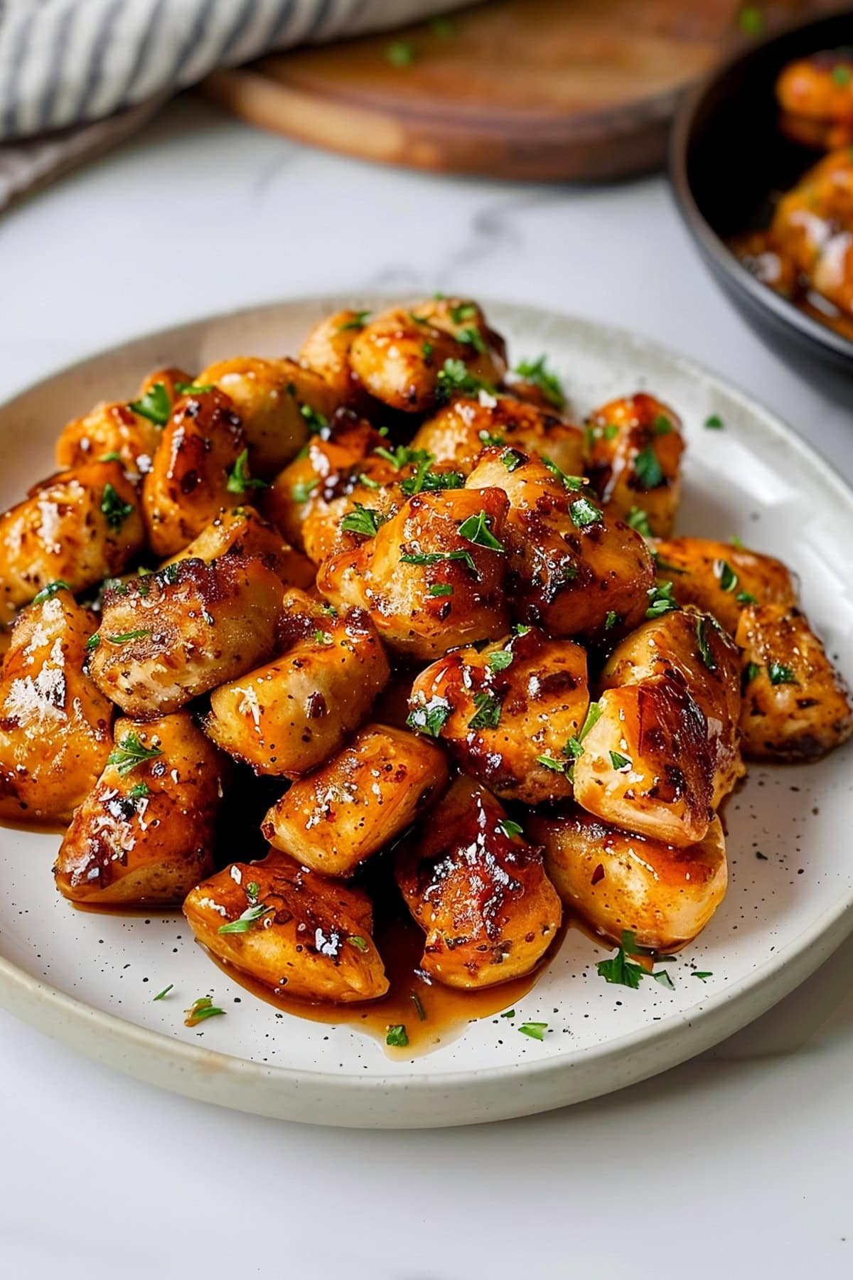 Tender, juicy, bite size pieces of chicken breast coated in a rich garlic and butter sauce