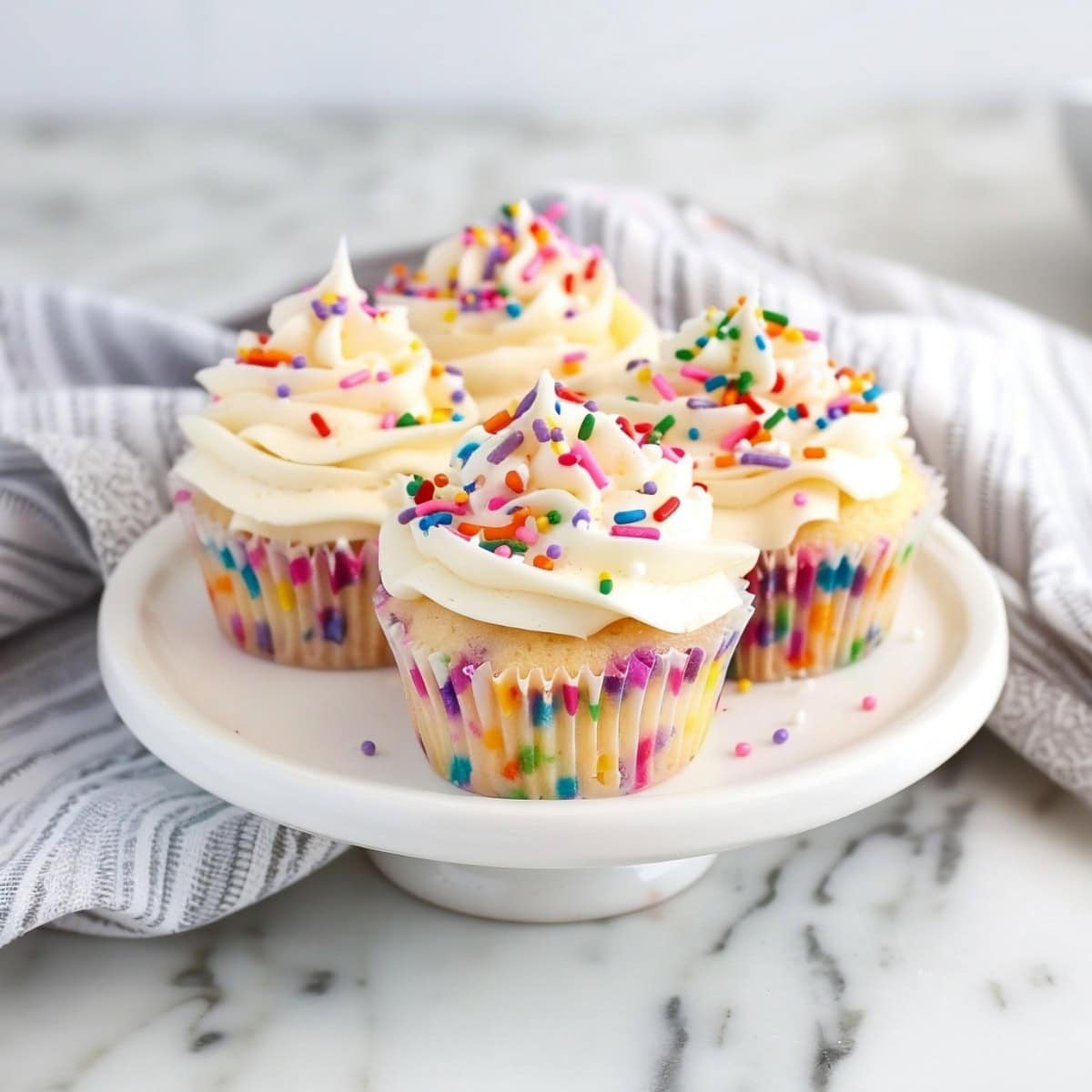 Flavorful funfetti cupcakes, packed with fun, colorful sprinkles and finished with a smooth buttercream.