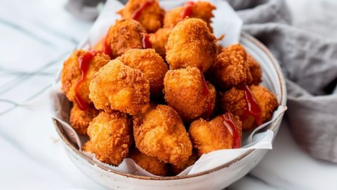 Golden nuggets of popcorn chicken, crunchy on the outside and juicy on the inside