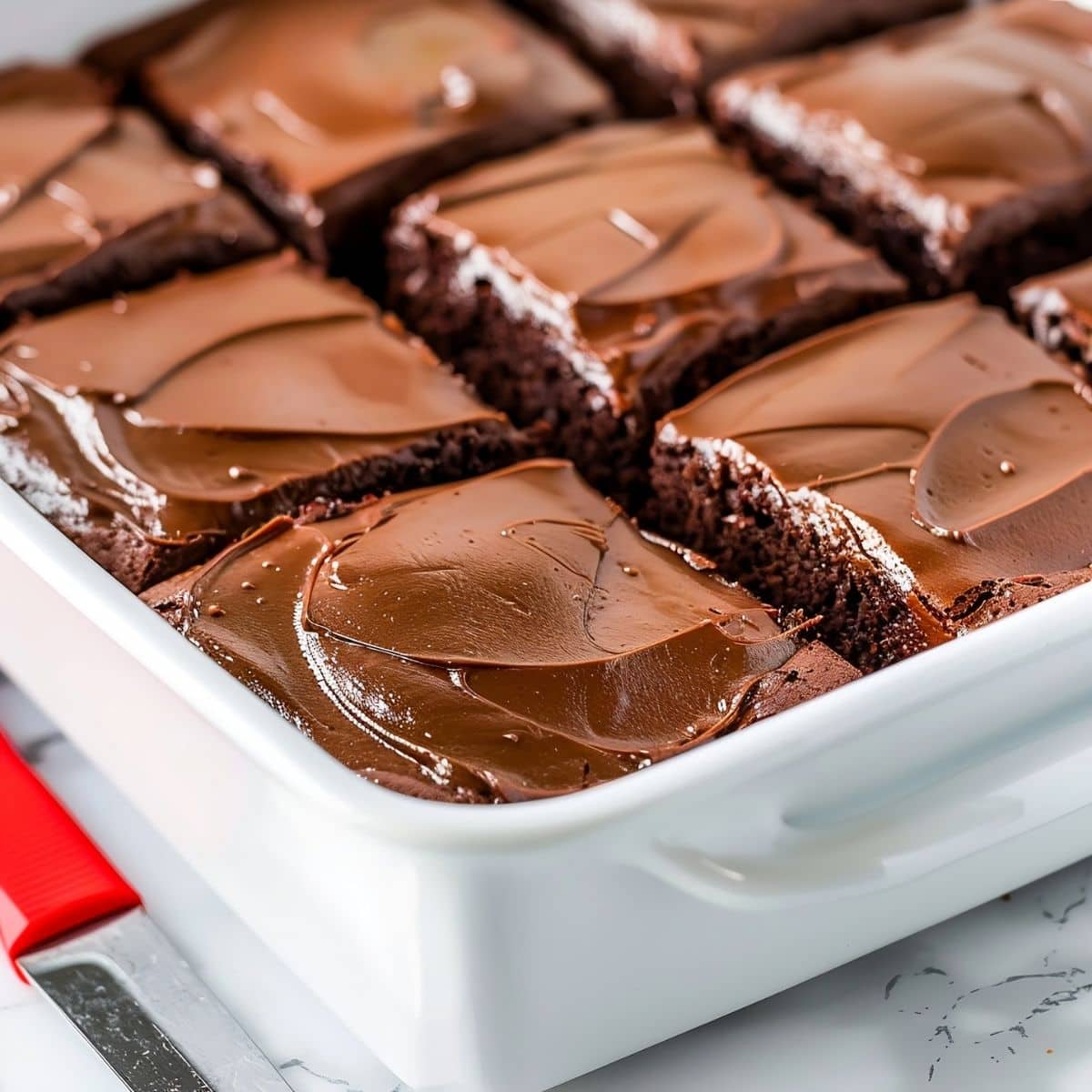 Coca Cola Cake in the Baking Dish, Cut into Slices