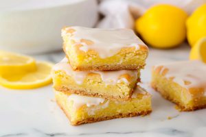 Irresistible lemon blondies, featuring a soft, chewy texture and a refreshing citrus taste