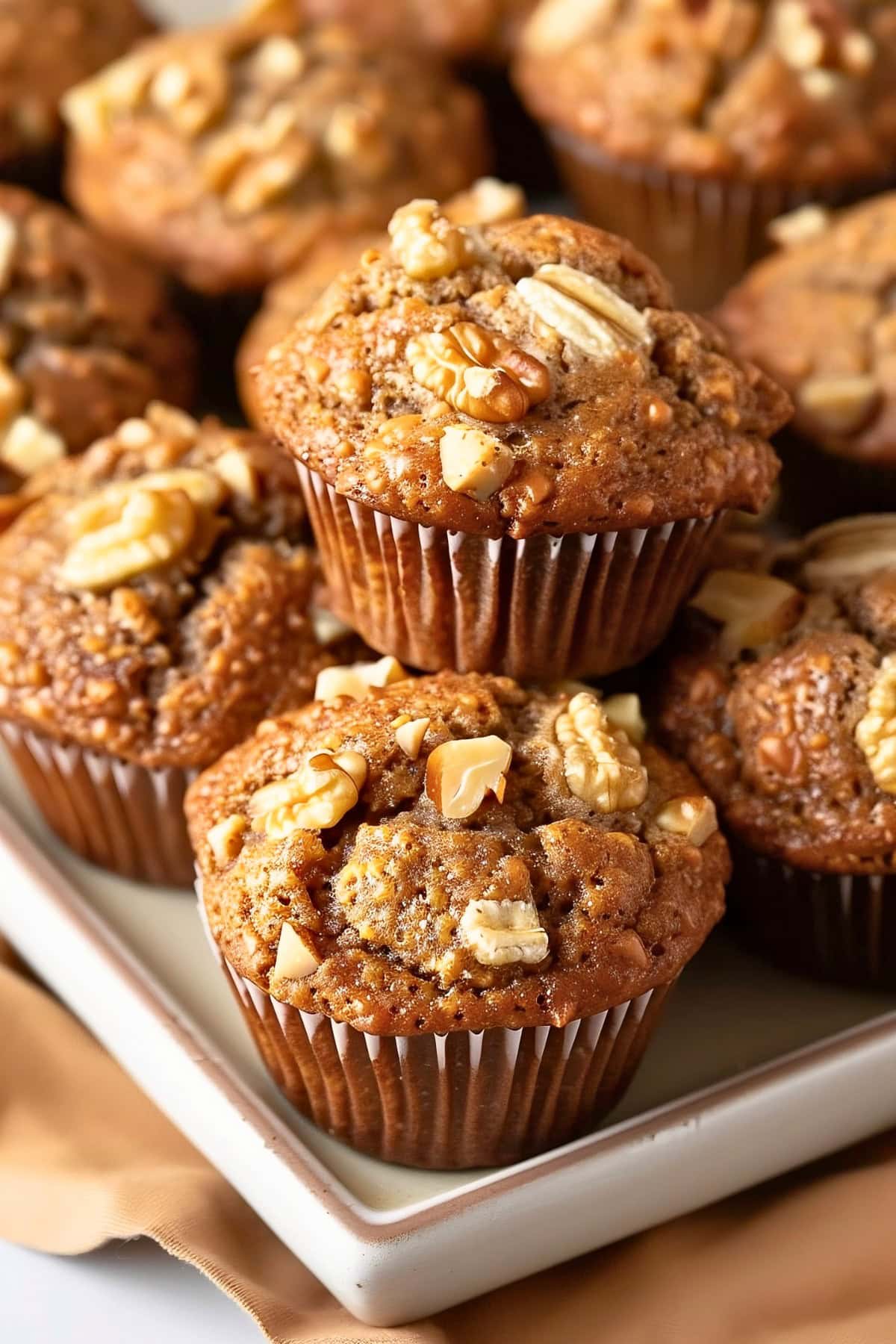 Banana Nut Muffins Stacked on a 