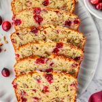 Top View Slices of Cranberry Orange Bread on a White Plate