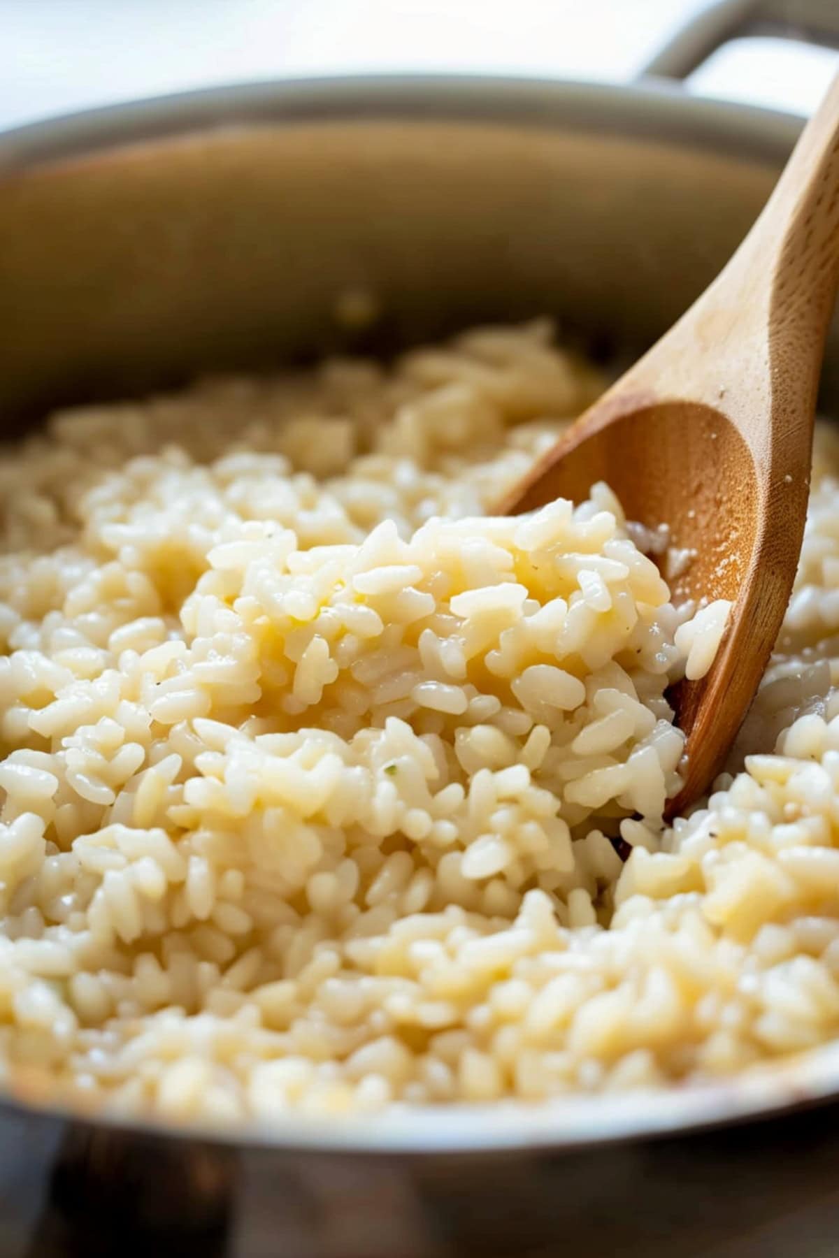 A saucepan filled with creamy rice risotto.