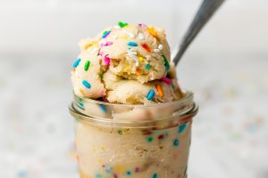 Smooth and delicious edible sugar cookie dough, ready to eat with a spoon.