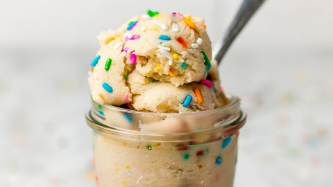 Smooth and delicious edible sugar cookie dough, ready to eat with a spoon.