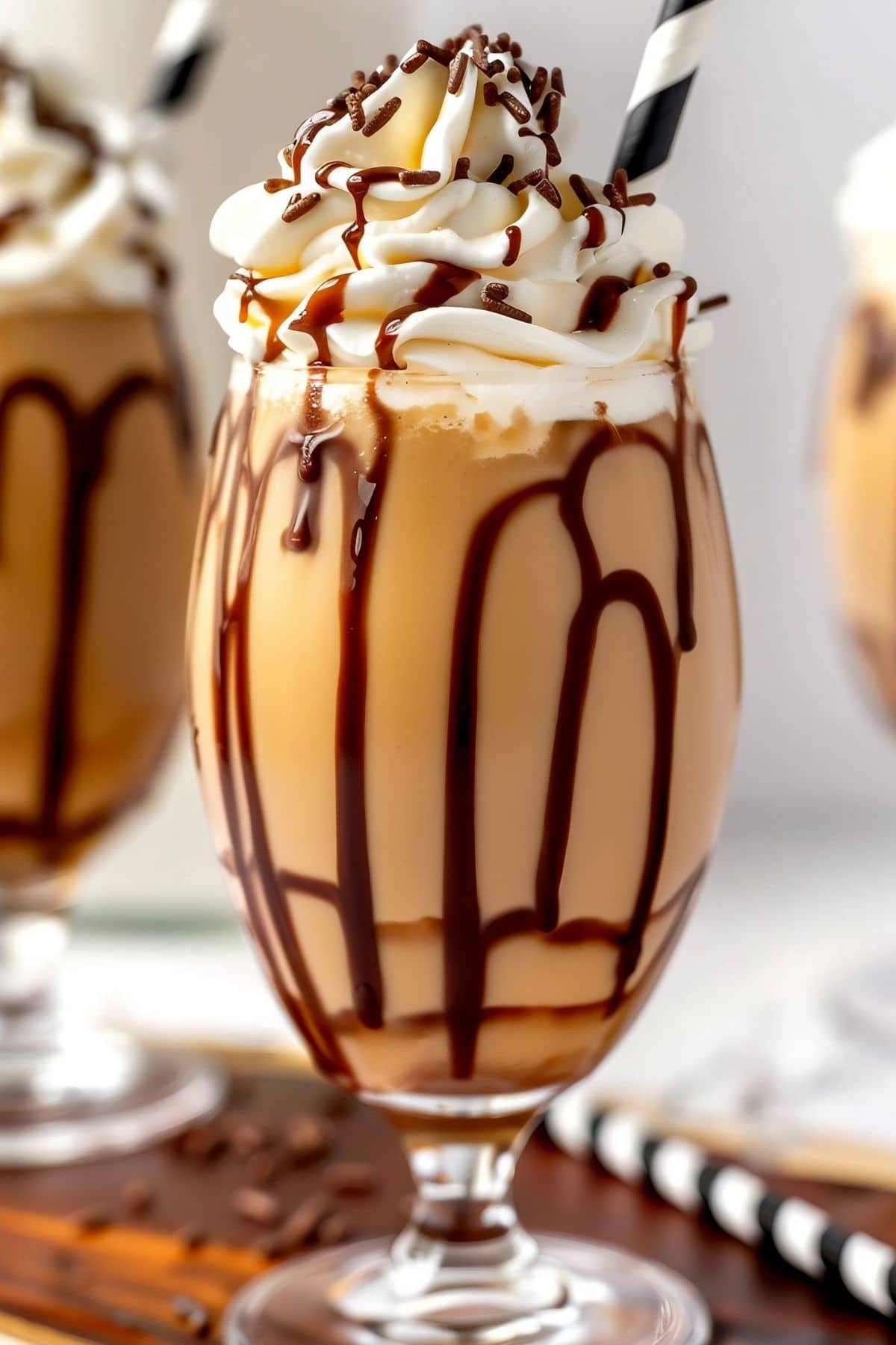 Close Up of Frozen Mudslide with Whipped Cream, Chocolate Drizzle, and Chocolate Sprinkles
