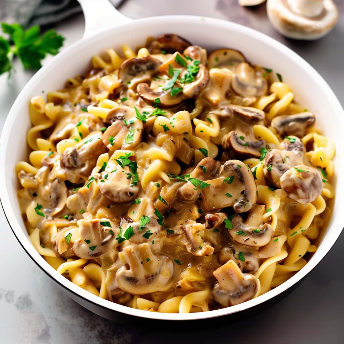 A skillet filled with freshly cooked mushroom stroganoff.