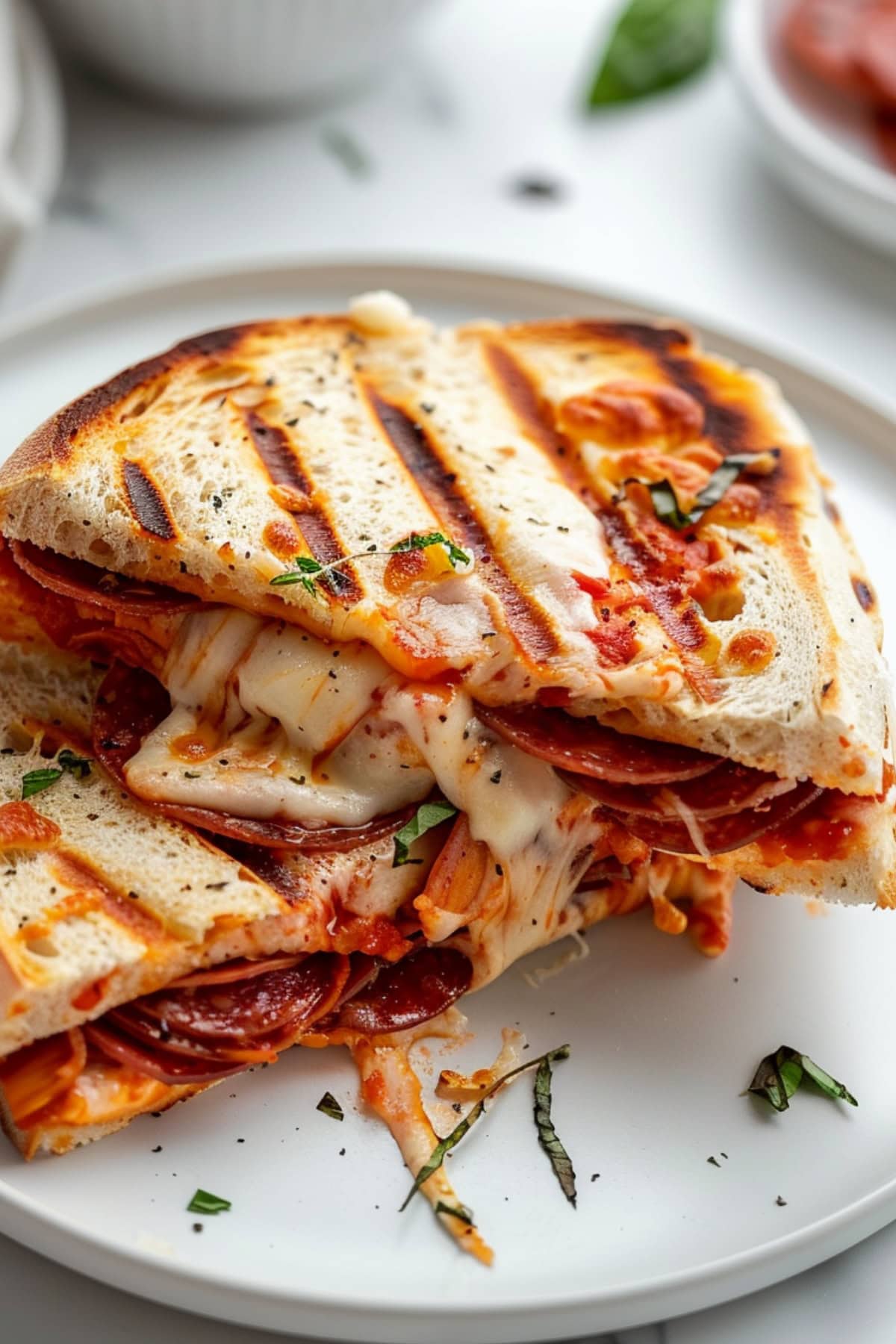 Pepperoni pizza Panini with melted mozzarella, spicy pepperoni and pizza sauce.