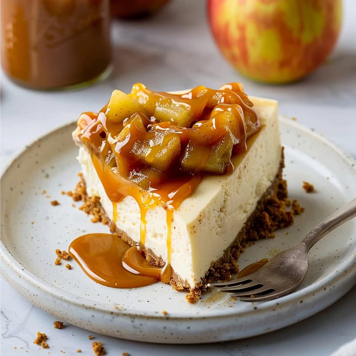 Cinnamon cheesecake topped with spiced apples and caramel