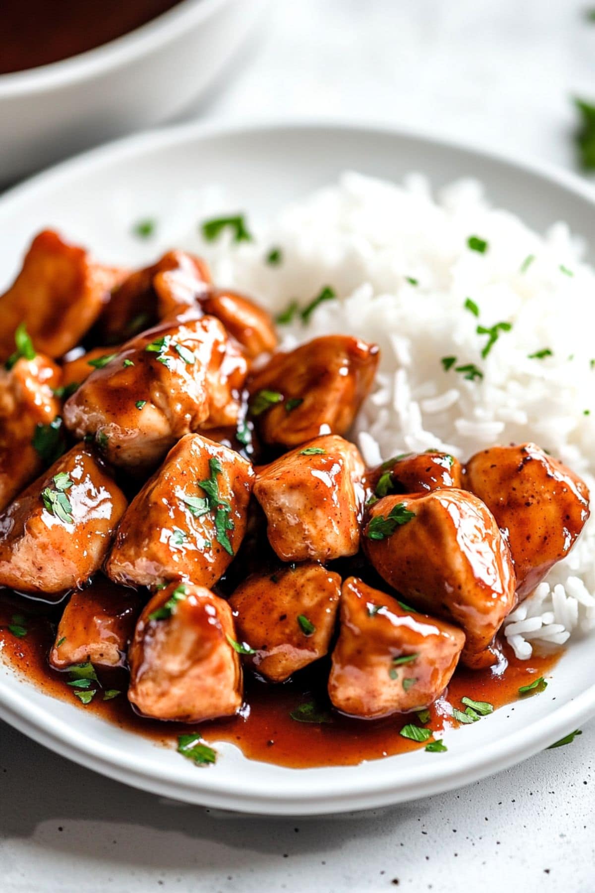 Rice served with bourbon chicken.