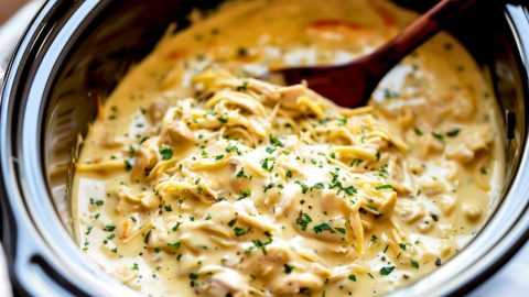 Crockpot Italian chicken made with shredded chicken in white creamy sauce.