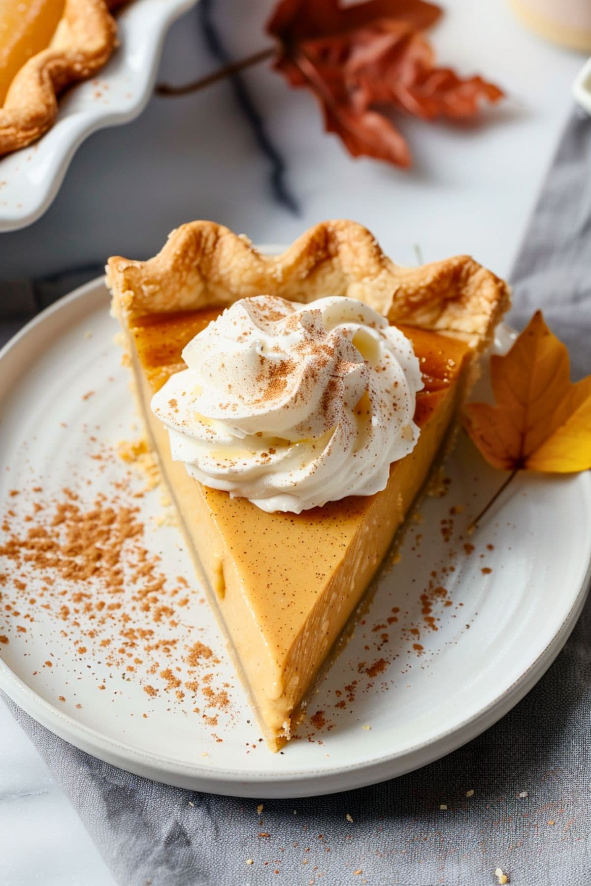 Perfect slice of maple cream pie served on a white plate.