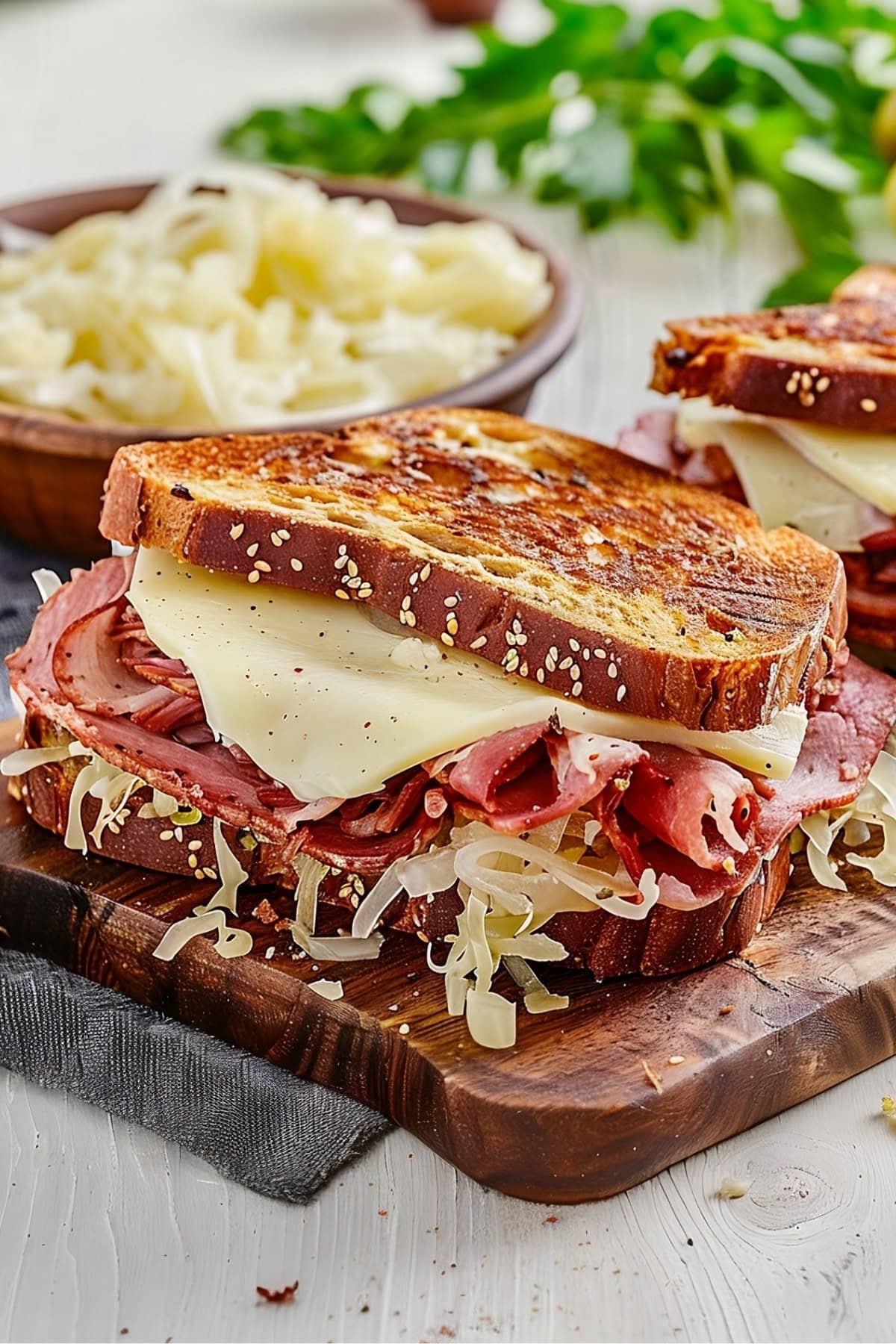 Reuben sandwich with melted cheese. 