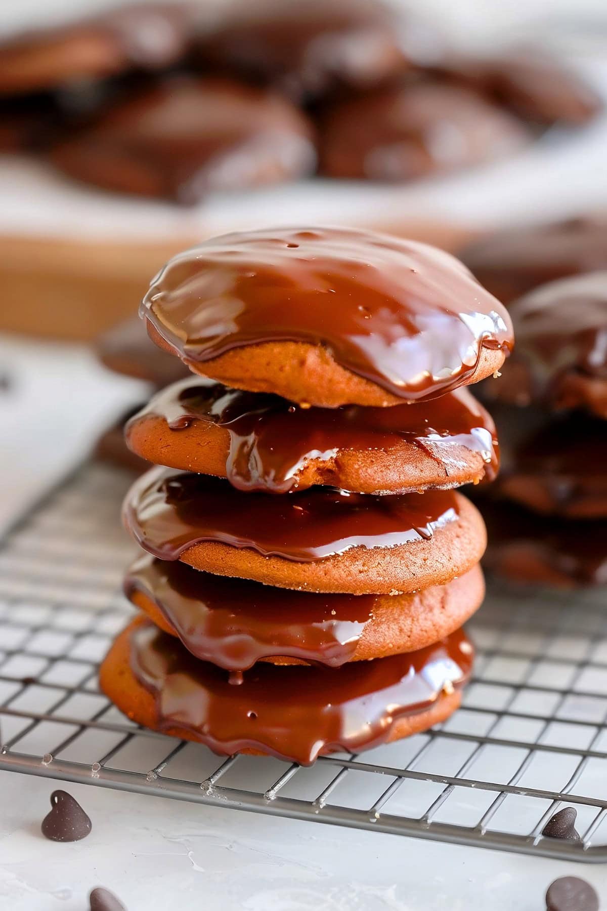 Texas sheet cake cookies stacked on a cooling rack