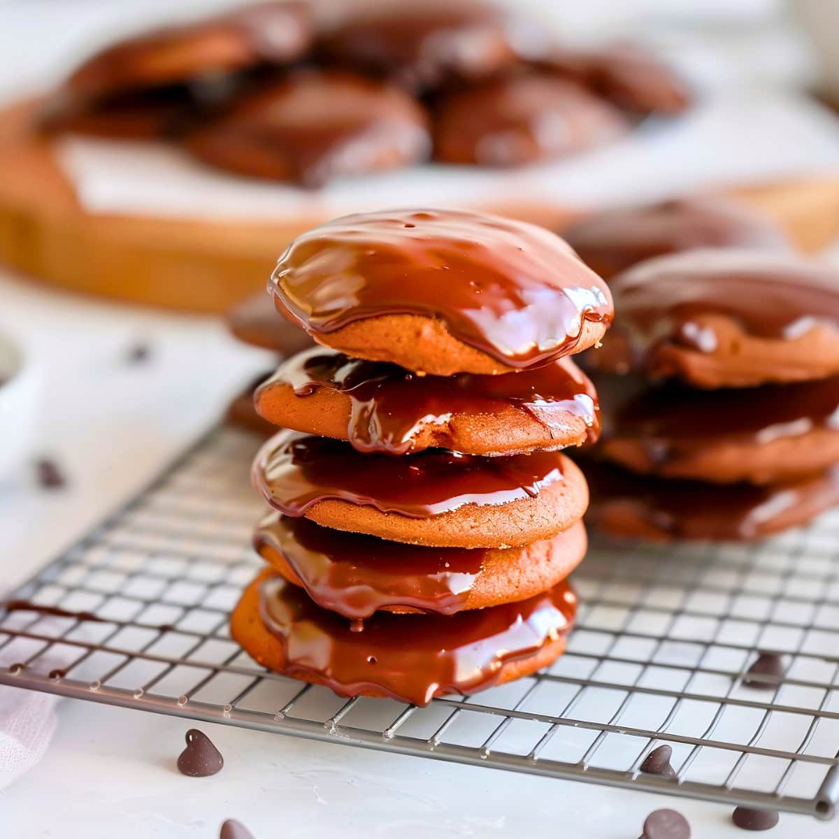 Freshly baked Texas sheet cake cookies with a rich, chocolate glaze and a moist, fudgy texture.