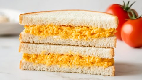 Classic tomato twiddle with cheese spread.