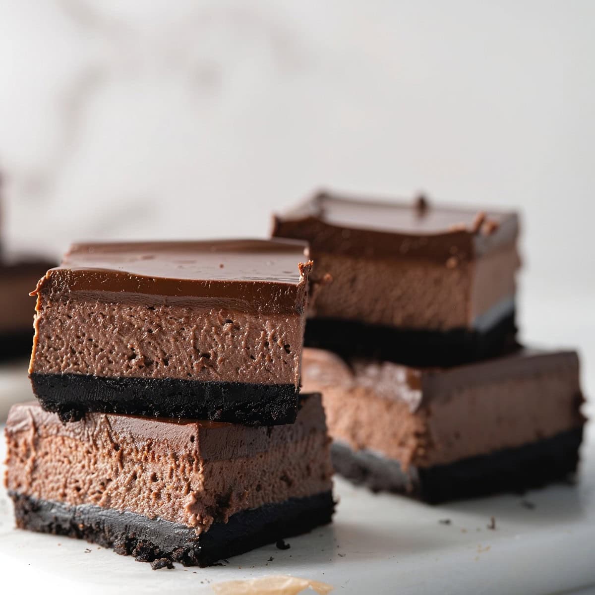 Chocolate Cheesecake Bars Stacked