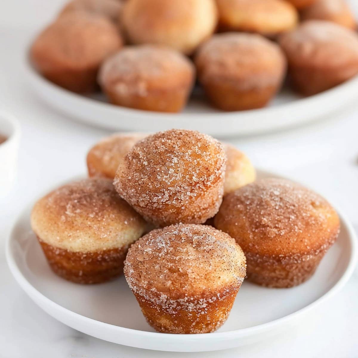 Donut Muffins arranged on a white plate