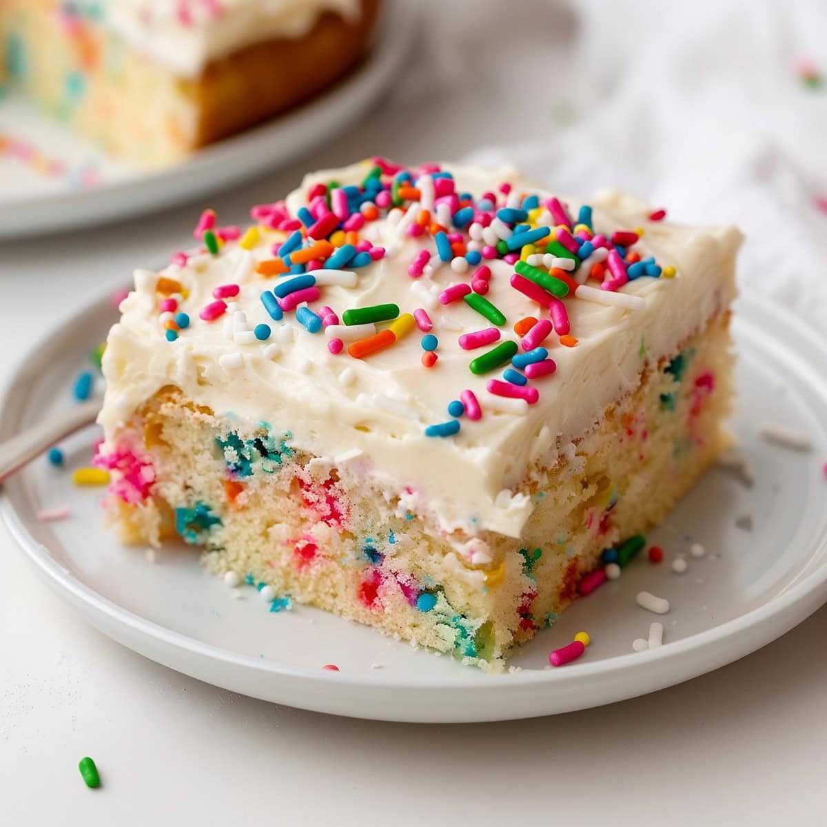 Funfetti Sheet Cake with a Smooth Frosting Layer.