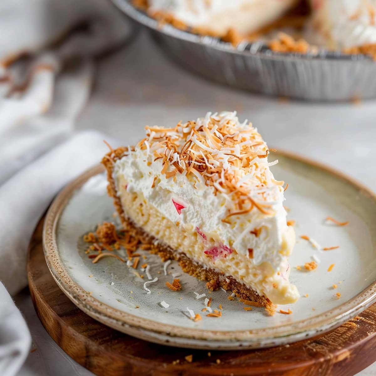 Piña Colada Cream Pie Slice on a Plate