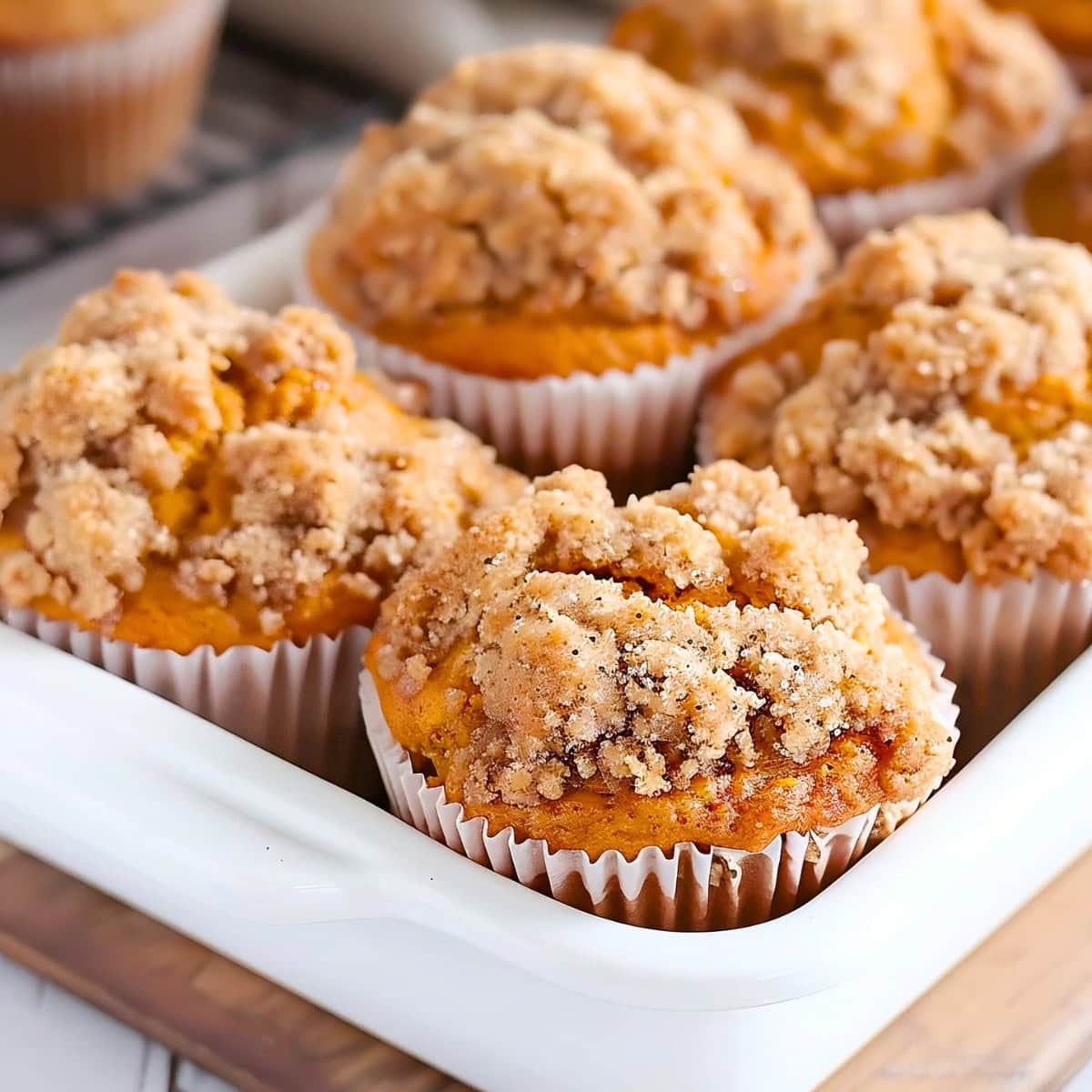 Pumpkin Streusel Muffins with cream cheese filling in a Baking Tray.